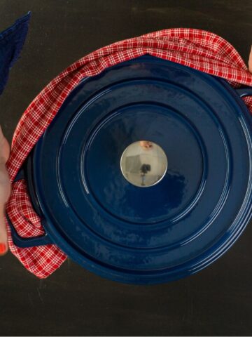 Enameled blue cast iron covered dutch oven